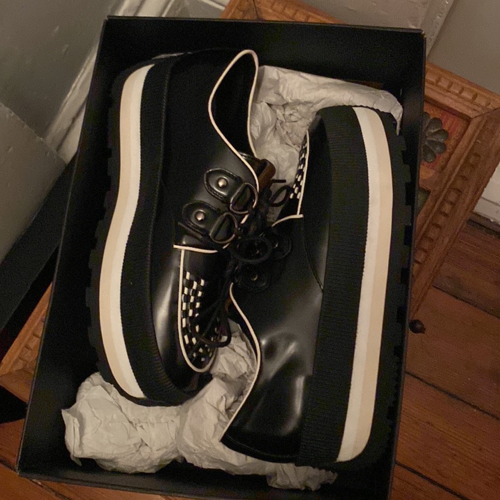 Coach, never worn, platform sneakers. Black and white.